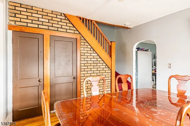 a bedroom with a bed and a table