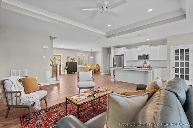 a room with wooden floor and window