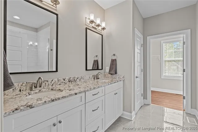 a view of a house with backyard and garden