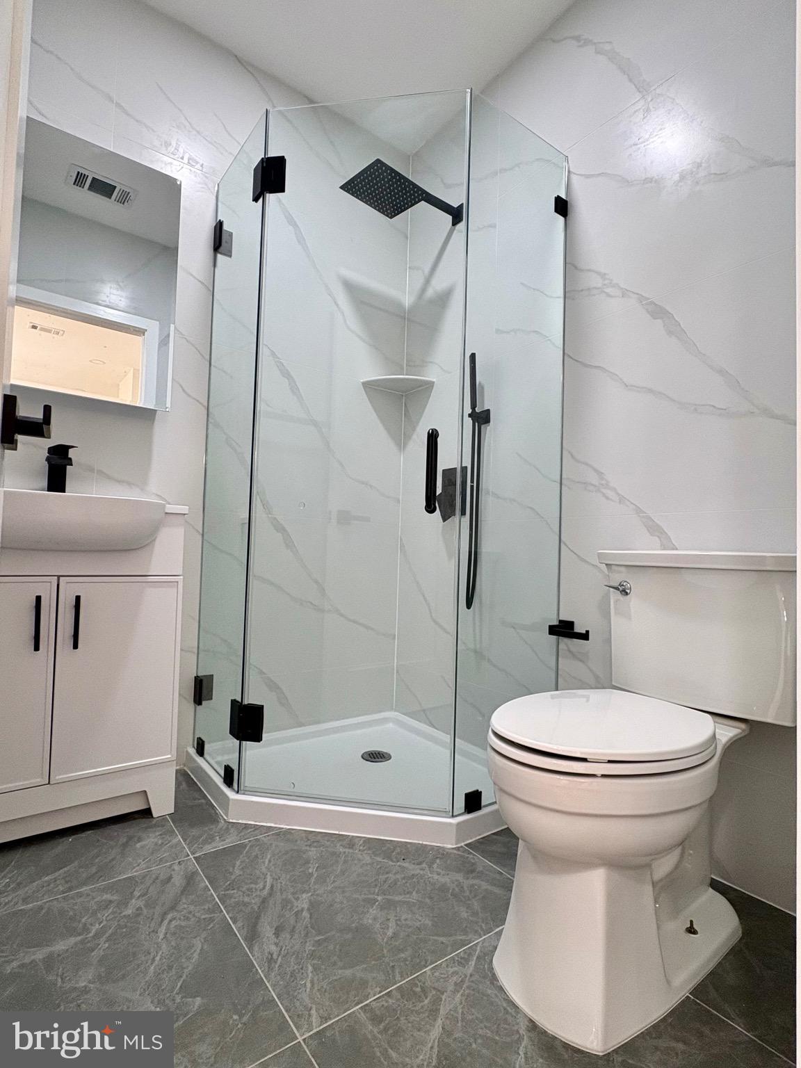 865 West Lancaster Avenue Bryn Mawr, PA 19010 - Photo 13 of 16 a bathroom with a sink toilet and shower