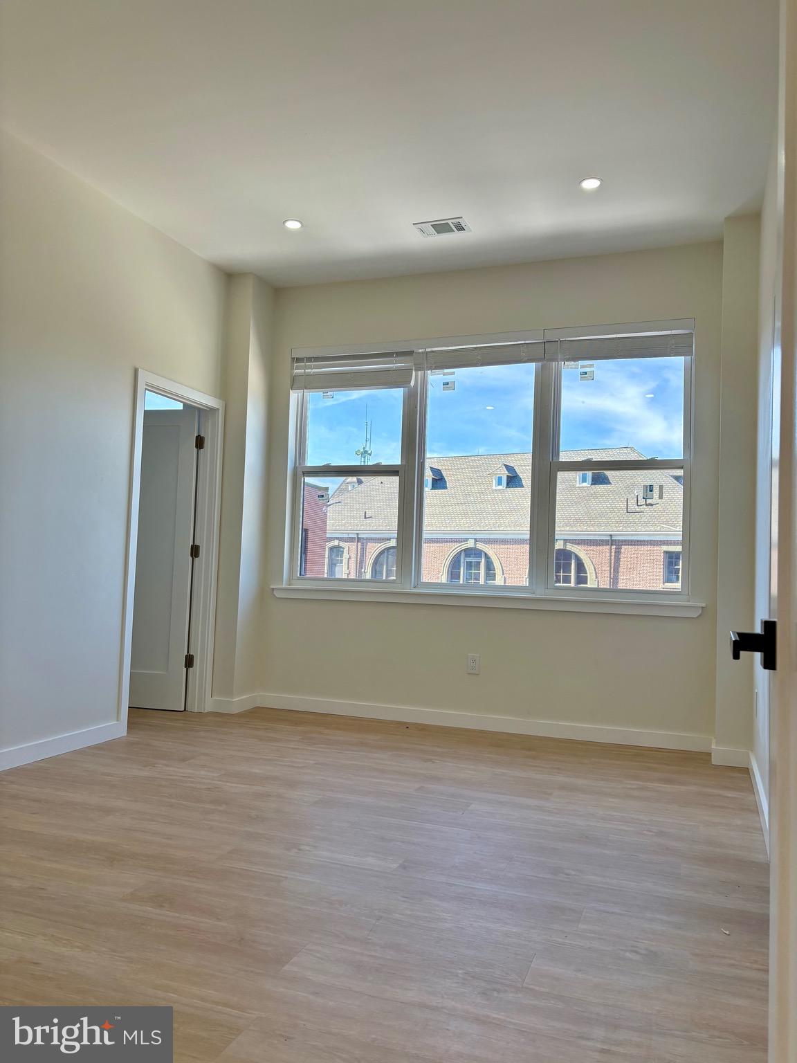 865 West Lancaster Avenue Bryn Mawr, PA 19010 - Photo 7 of 16 a view of room with window and a ceiling fan