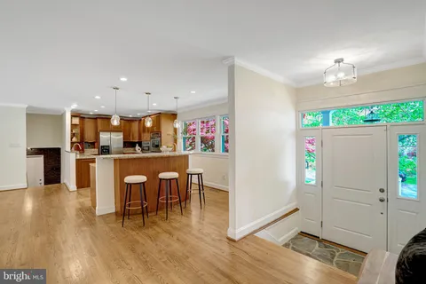 a large kitchen with lots of counter space a sink and appliances