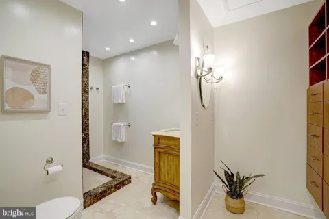 a view of entryway with stairs and wooden floor