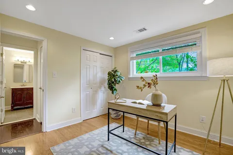 a view of yard with seating area and green space