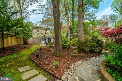 a garden view with a seating space