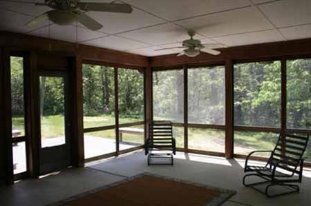 1775 Nauset Road Eastham, MA 02642 - Photo 6 of 13 a view of a livingroom with furniture and floor to ceiling window