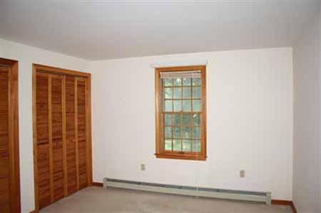 1775 Nauset Road Eastham, MA 02642 - Photo 7 of 13 an empty room with windows