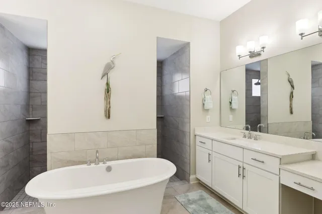 a bedroom with a bed and a chair