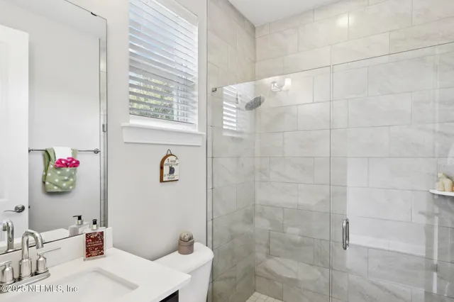 a terrace with outdoor seating and city view