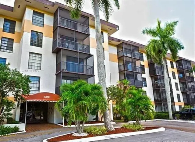 a view of a building with a street