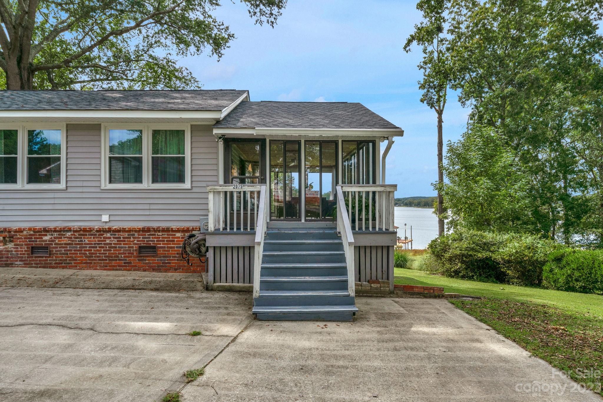 2075 Rolling Hills Road Ridgeway, SC 29130 - Photo 33 of 40 a front view of a house with a yard
