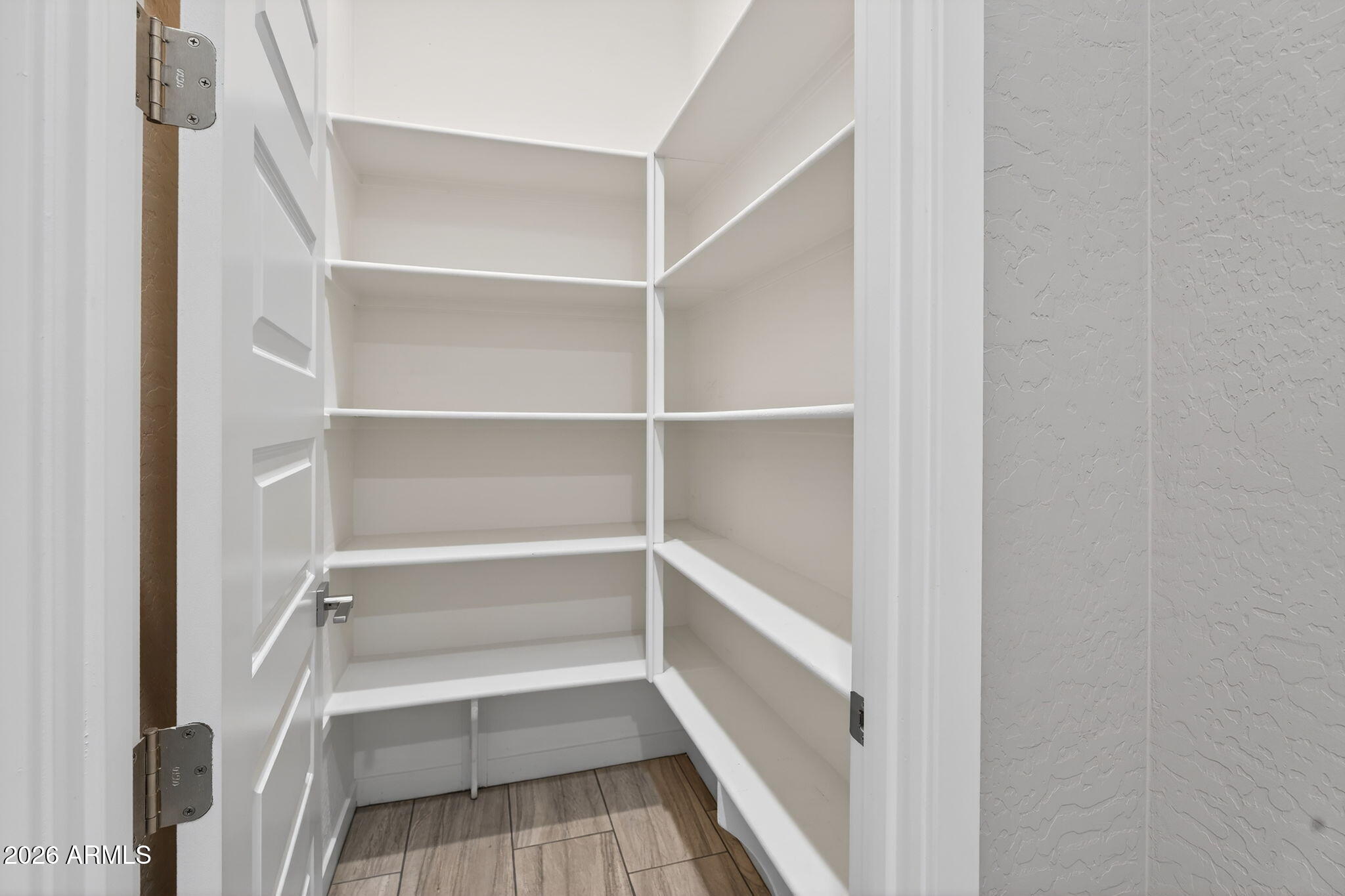 3075 East Appaloosa Road Gilbert, AZ 85296 - Photo 12 of 41 a view of a room with shelf