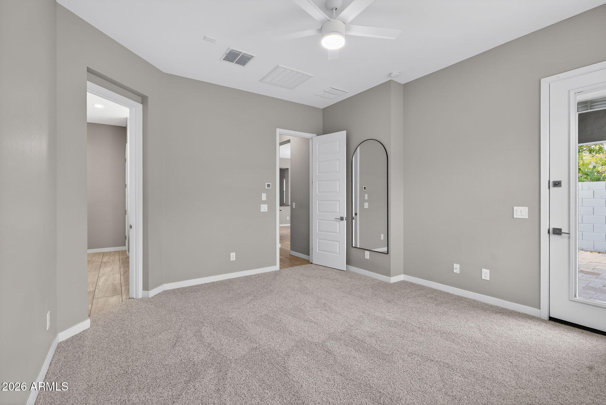 3075 East Appaloosa Road Gilbert, AZ 85296 - Photo 14 of 41 a view of an empty room with a bathroom