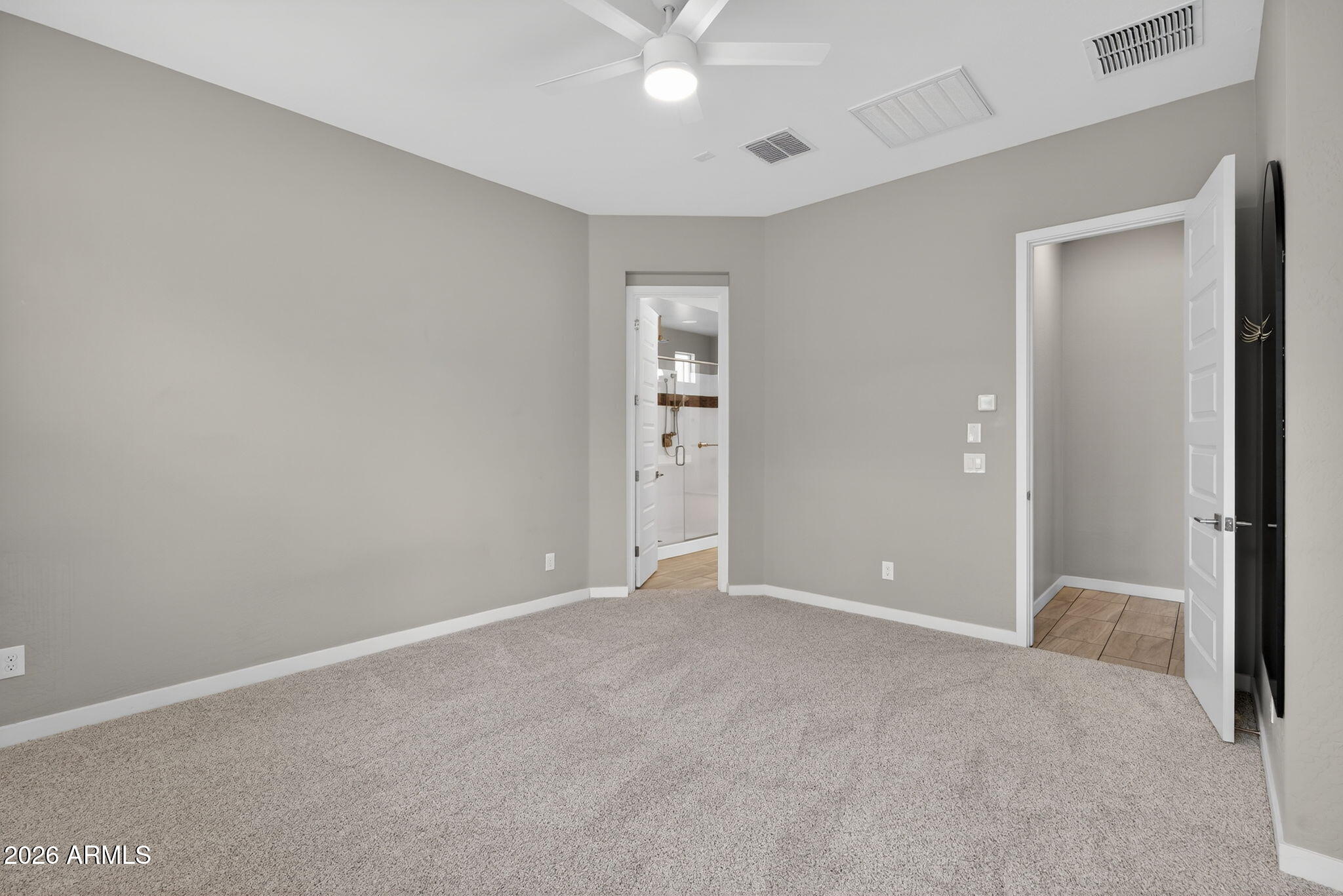 3075 East Appaloosa Road Gilbert, AZ 85296 - Photo 16 of 41 a view of an empty room with a window
