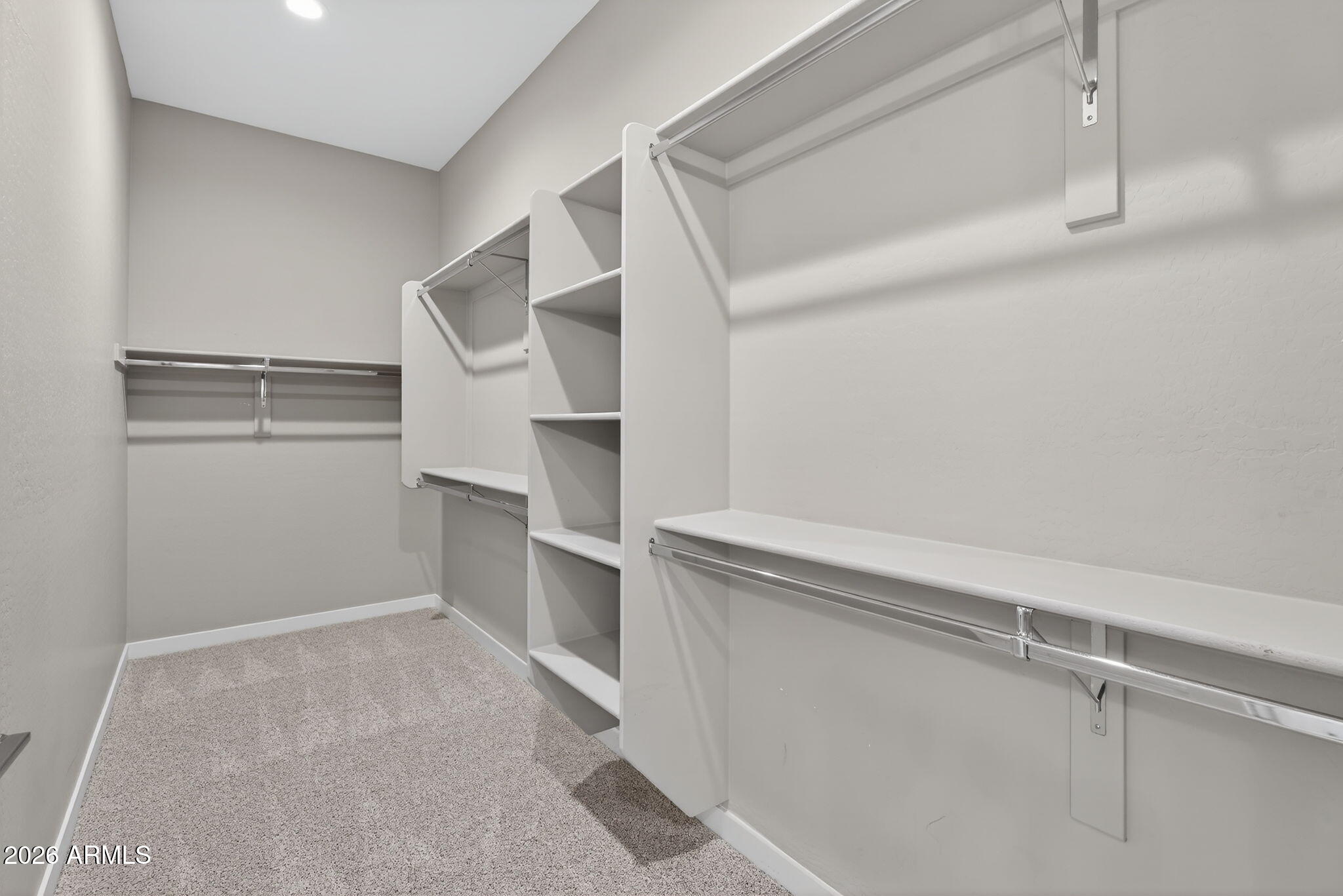 3075 East Appaloosa Road Gilbert, AZ 85296 - Photo 20 of 41 a view of an empty walk in closet