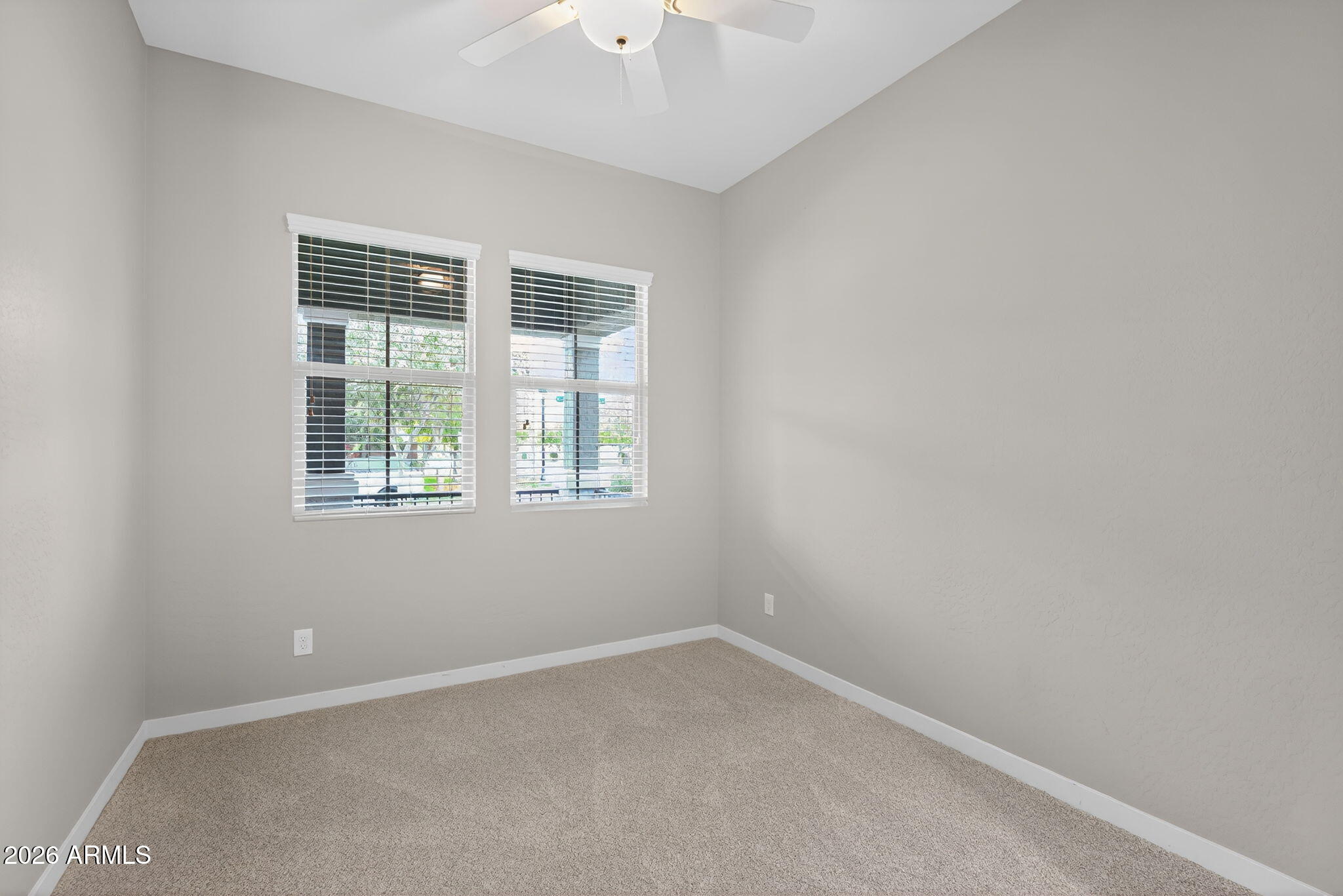 3075 East Appaloosa Road Gilbert, AZ 85296 - Photo 22 of 41 an empty room with a window