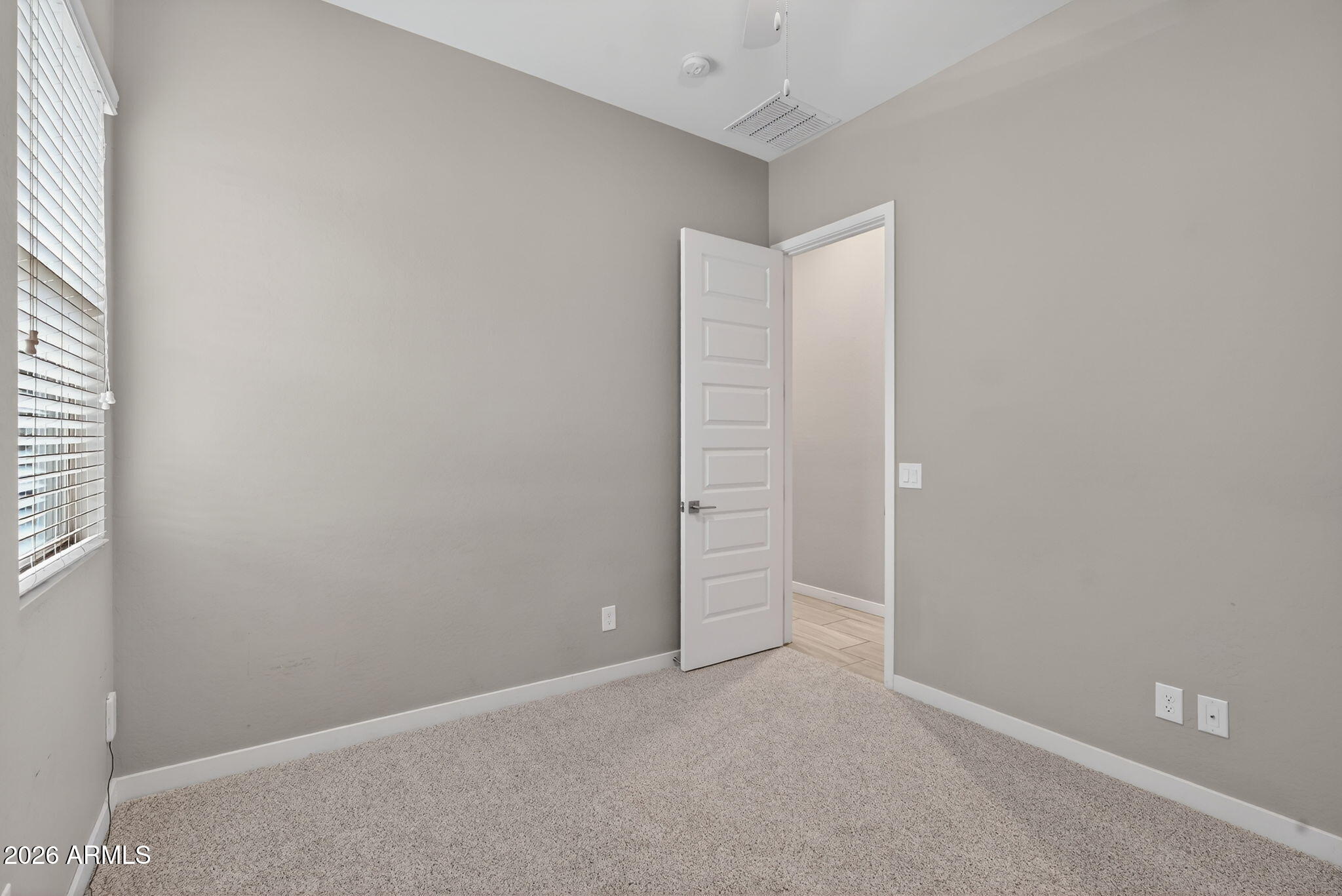 3075 East Appaloosa Road Gilbert, AZ 85296 - Photo 25 of 41 an empty room with windows