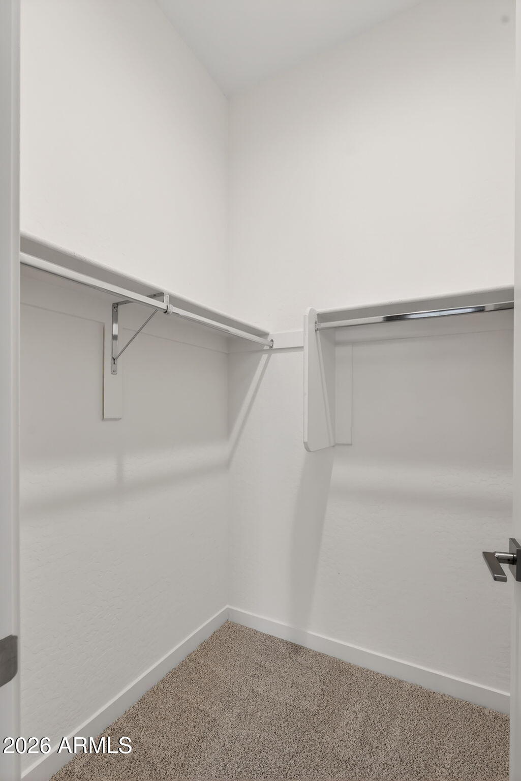 3075 East Appaloosa Road Gilbert, AZ 85296 - Photo 28 of 41 a view of an empty walk in closet