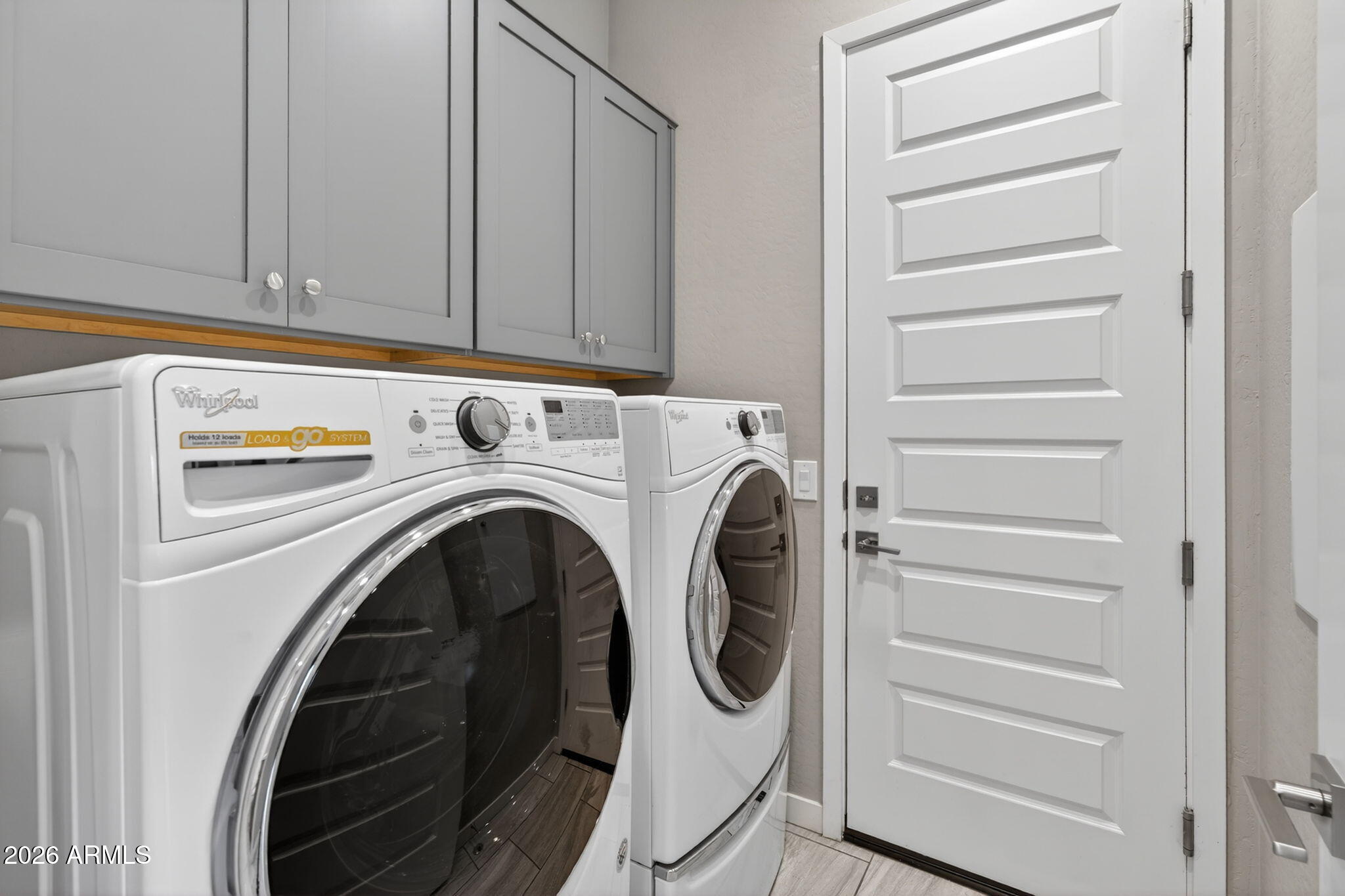 3075 East Appaloosa Road Gilbert, AZ 85296 - Photo 29 of 41 a utility room with dryer and washer