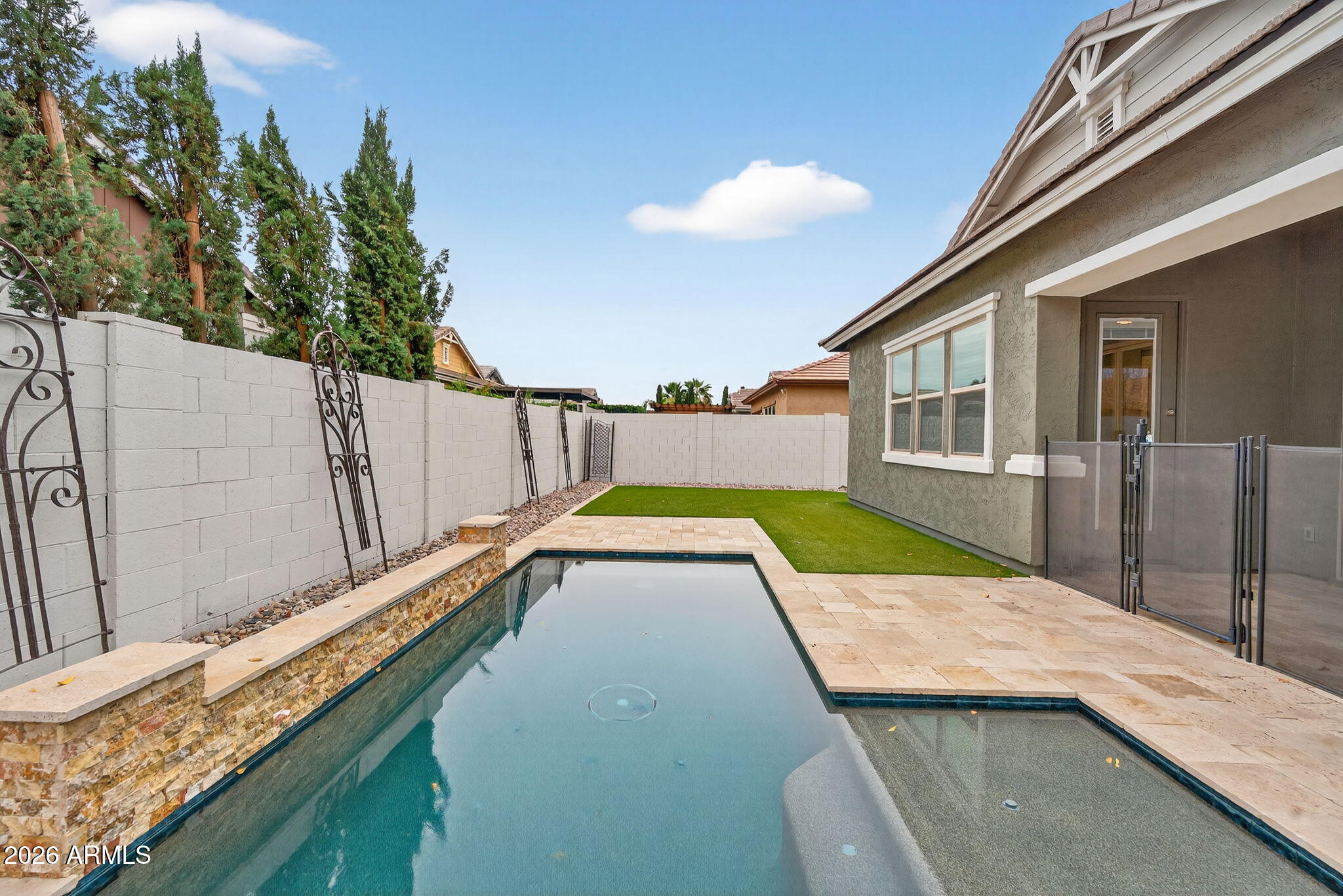 3075 East Appaloosa Road Gilbert, AZ 85296 - Photo 32 of 41 a view of a balcony with a swimming pool