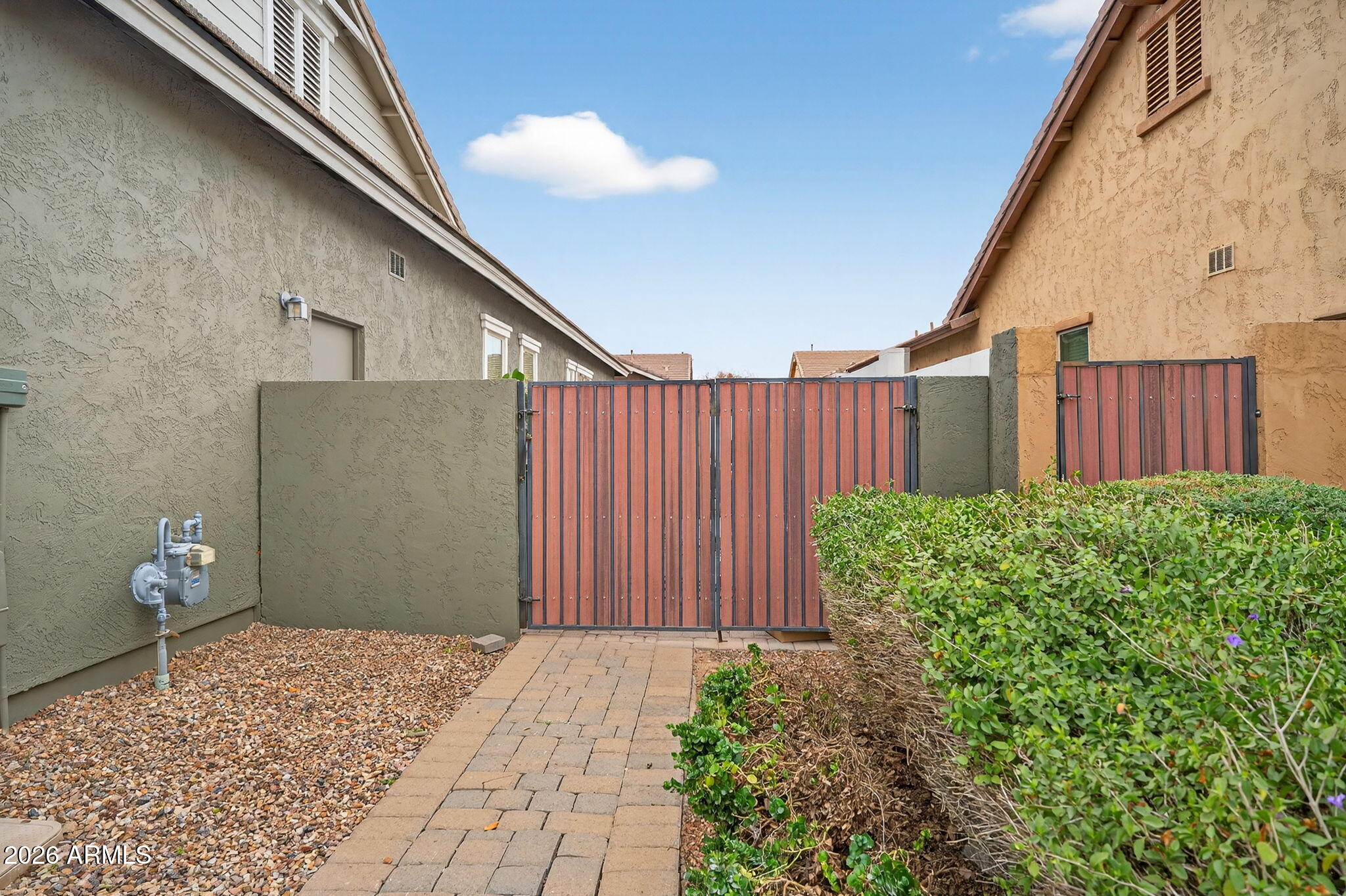 3075 East Appaloosa Road Gilbert, AZ 85296 - Photo 40 of 41 a front view of a house with garden