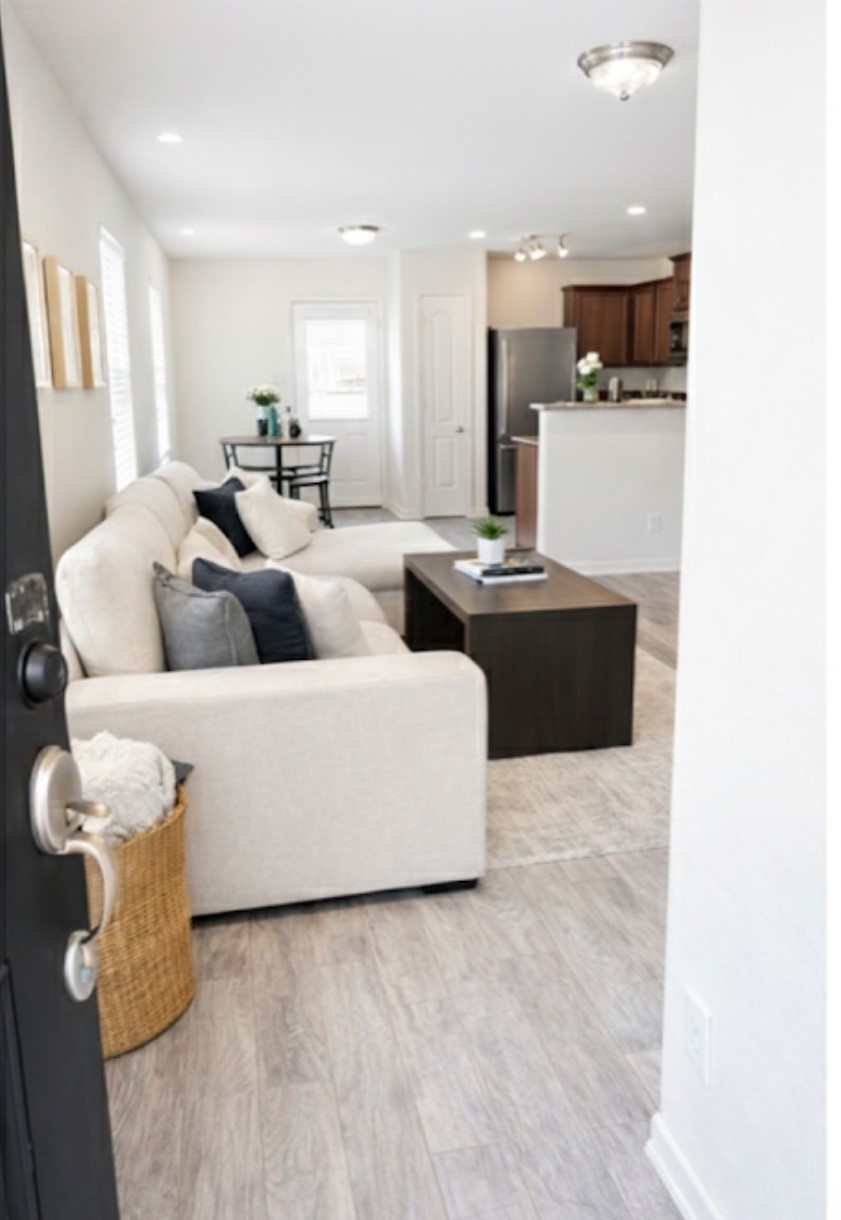 11230 Hall Ranch Court Houston, TX 77075 - Photo 2 of 21 a living room with furniture and kitchen