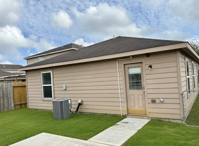 a bathroom with a shower and a bath tub