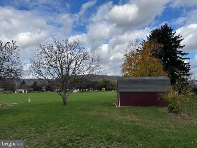 a view of outdoor space and yard