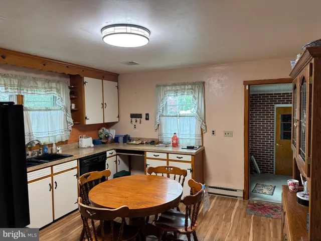 a room with gym equipment and a large window