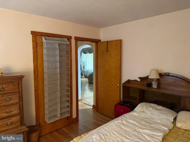 a bathroom with a shower and a sink