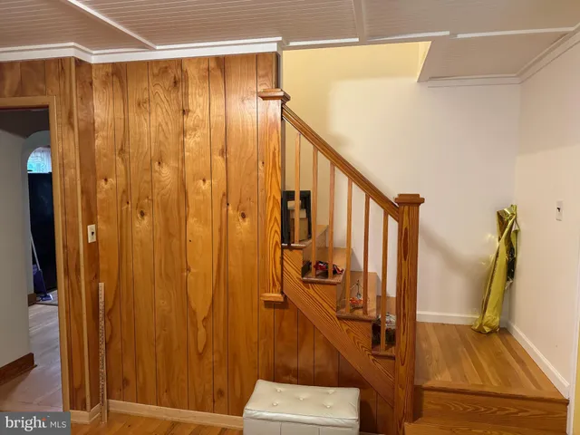 a bed room with a bed furniture and a mirror