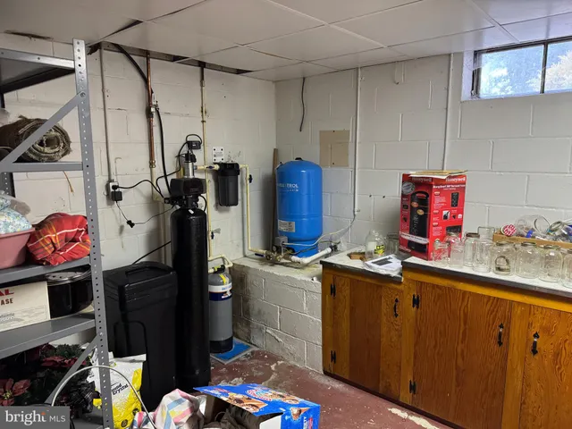 a bathroom with a sink and mirror