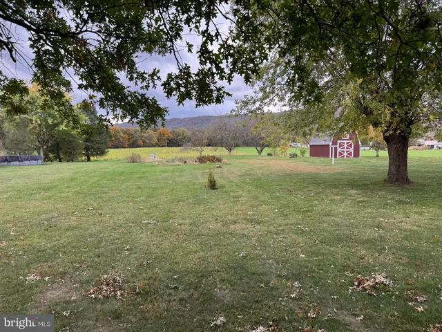a view of an outdoor space and a yard