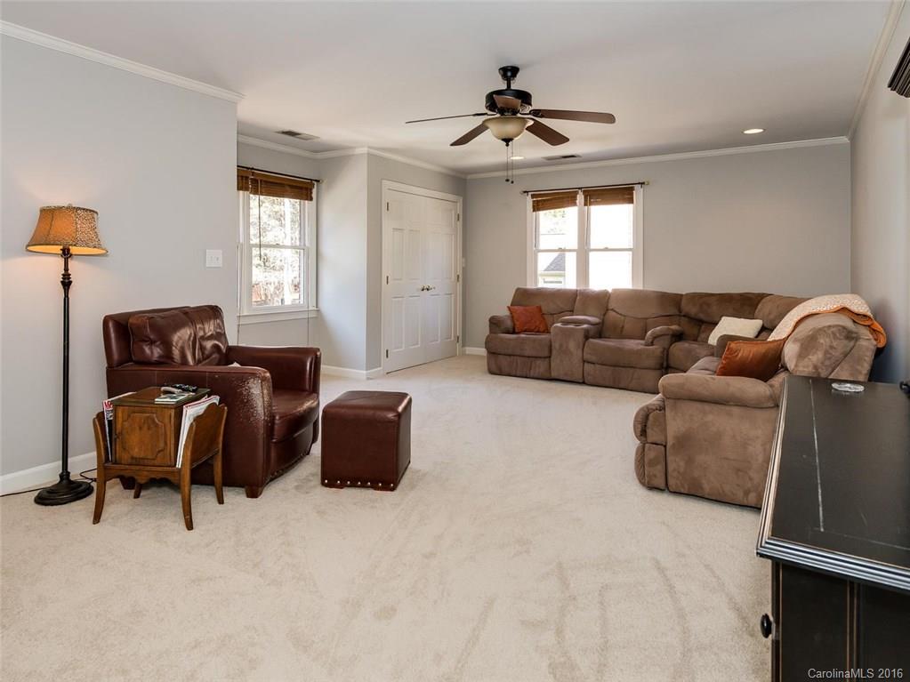 4822 Nora's Path Road Charlotte, NC 28226 - Photo 23 of 24 a living room with furniture and a window