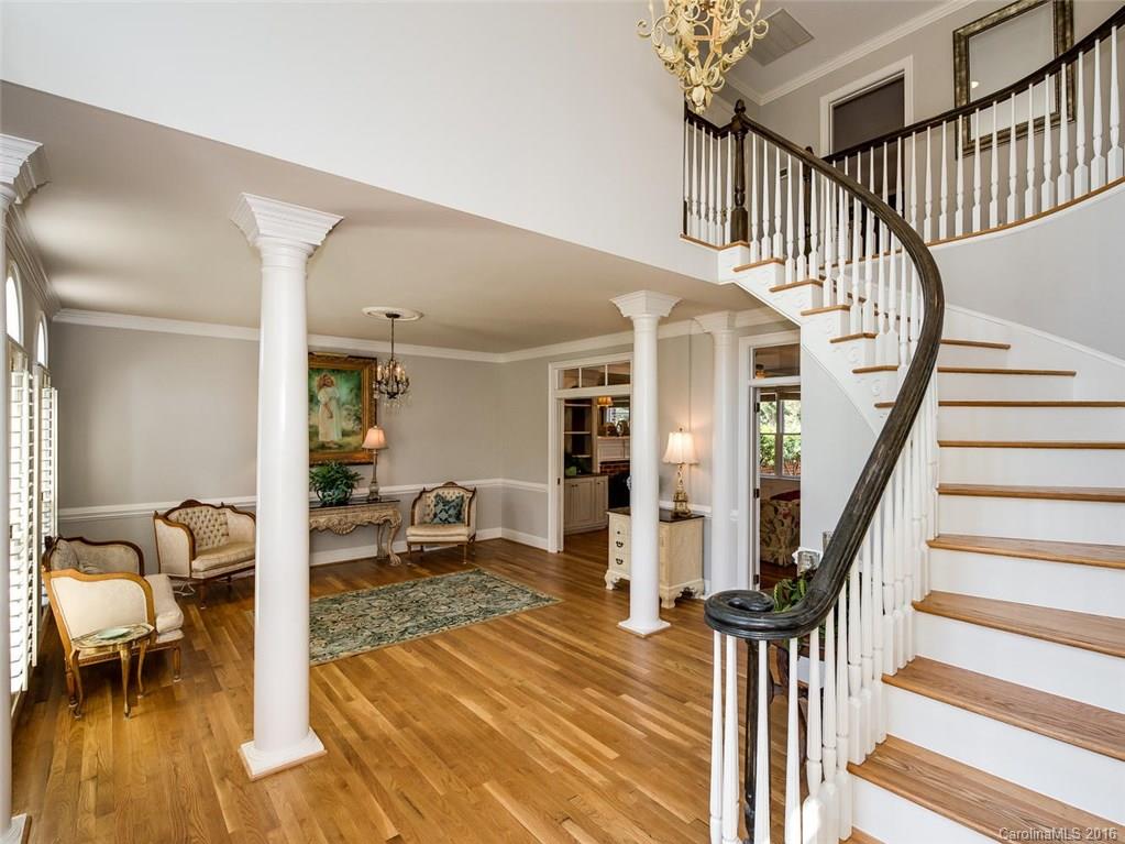 4822 Nora's Path Road Charlotte, NC 28226 - Photo 6 of 24 a view of entryway livingroom and hall with wooden floor