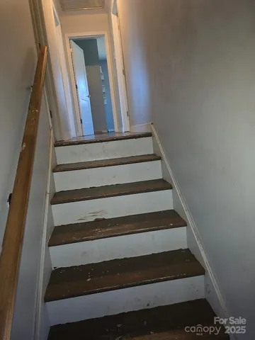 a workspace with furniture and wooden floor