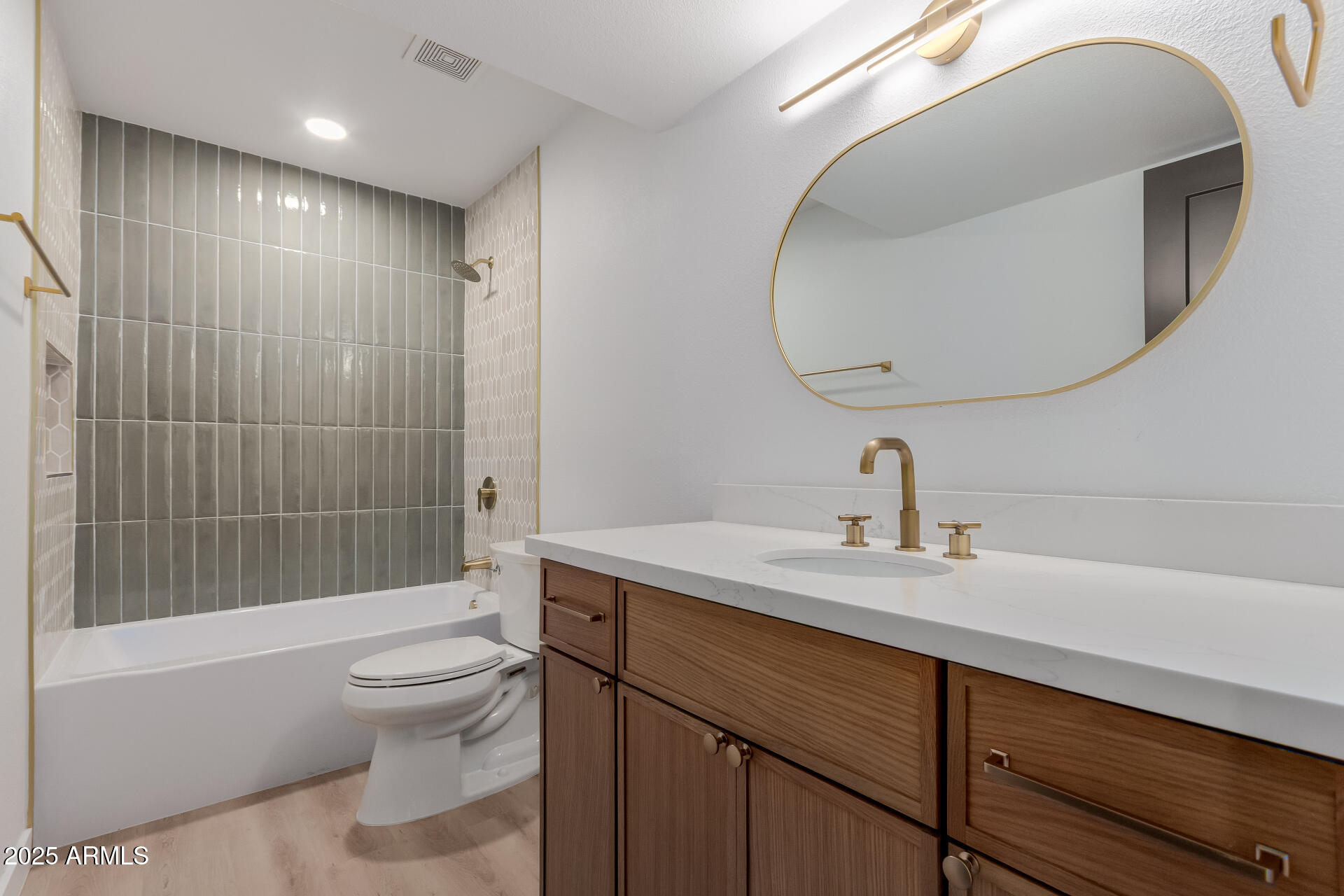 8055 East Thomas Road, Unit M101 Scottsdale, AZ 85251 - Photo 12 of 33 a bathroom with a sink a toilet and shower
