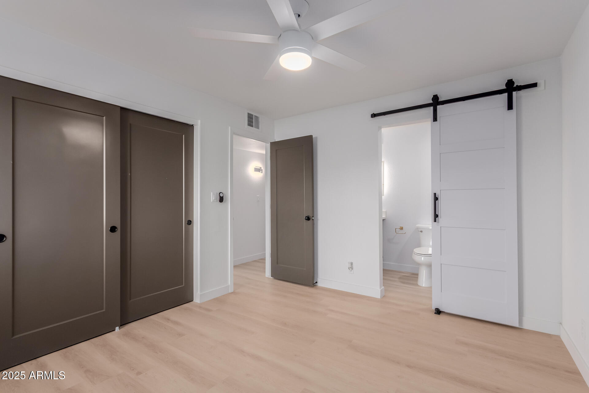 8055 East Thomas Road, Unit M101 Scottsdale, AZ 85251 - Photo 17 of 33 a big room with closet and a bathroom