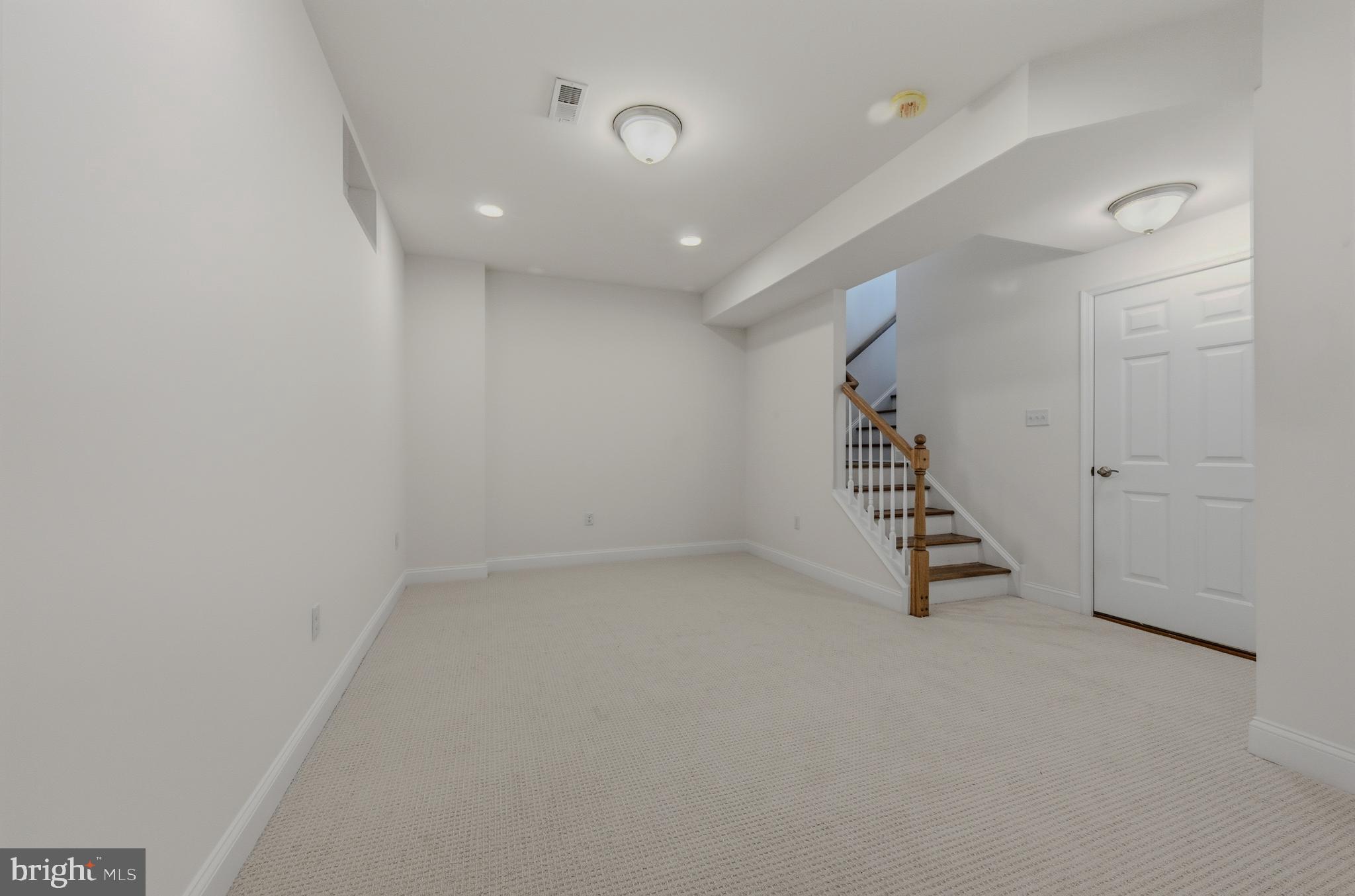 253 Grove View Drive Hockessin, DE 19707 - Photo 20 of 25 a view of an empty room with a entryway