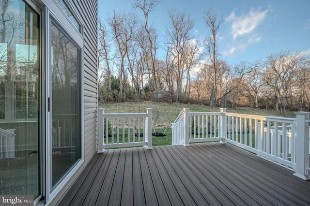 a view of backyard with green space