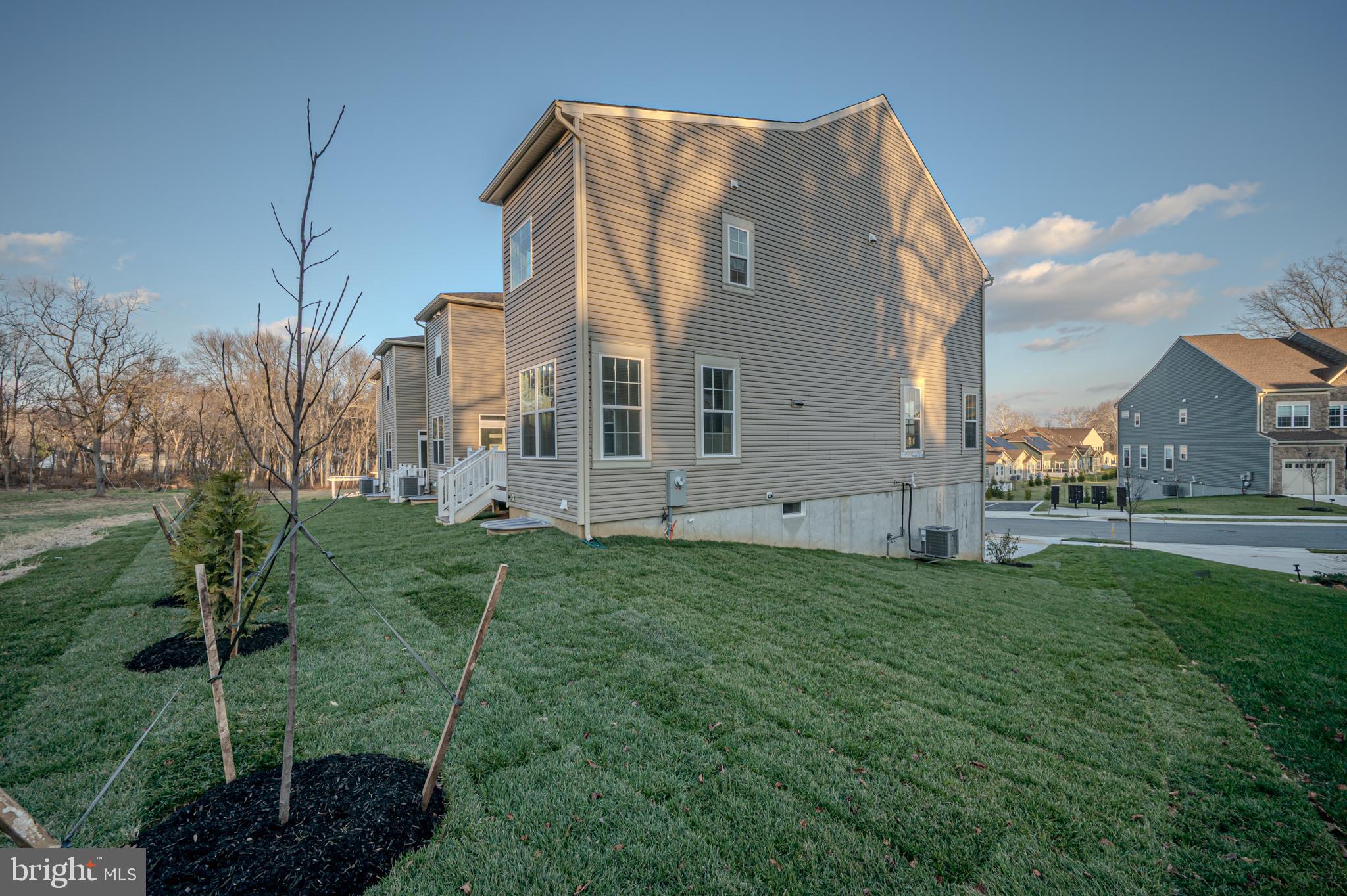 253 Grove View Drive Hockessin, DE 19707 - Photo 25 of 25 a view of a back yard of the house
