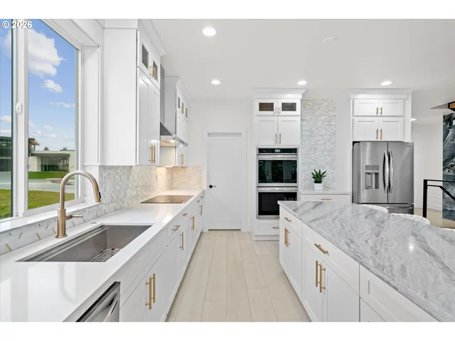 a kitchen with a stove and a microwave