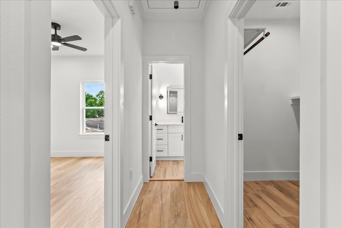 8323 Observatory Street, Unit A/B Houston, TX 77088 - Photo 37 of 38 Unit B - The thoughtfully designed second-level split floor plan offers added privacy and functionality, with the primary suite separated from the secondary bedrooms.