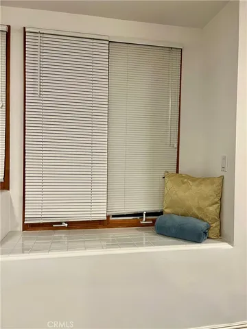 a view of a refrigerator in the kitchen