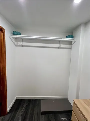 a view of small space with racks on the wall