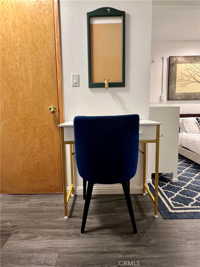 12 Coach Road Rancho Palos Verdes, CA 90275 - Photo 7 of 26 a room with table chairs and a painting on the wall