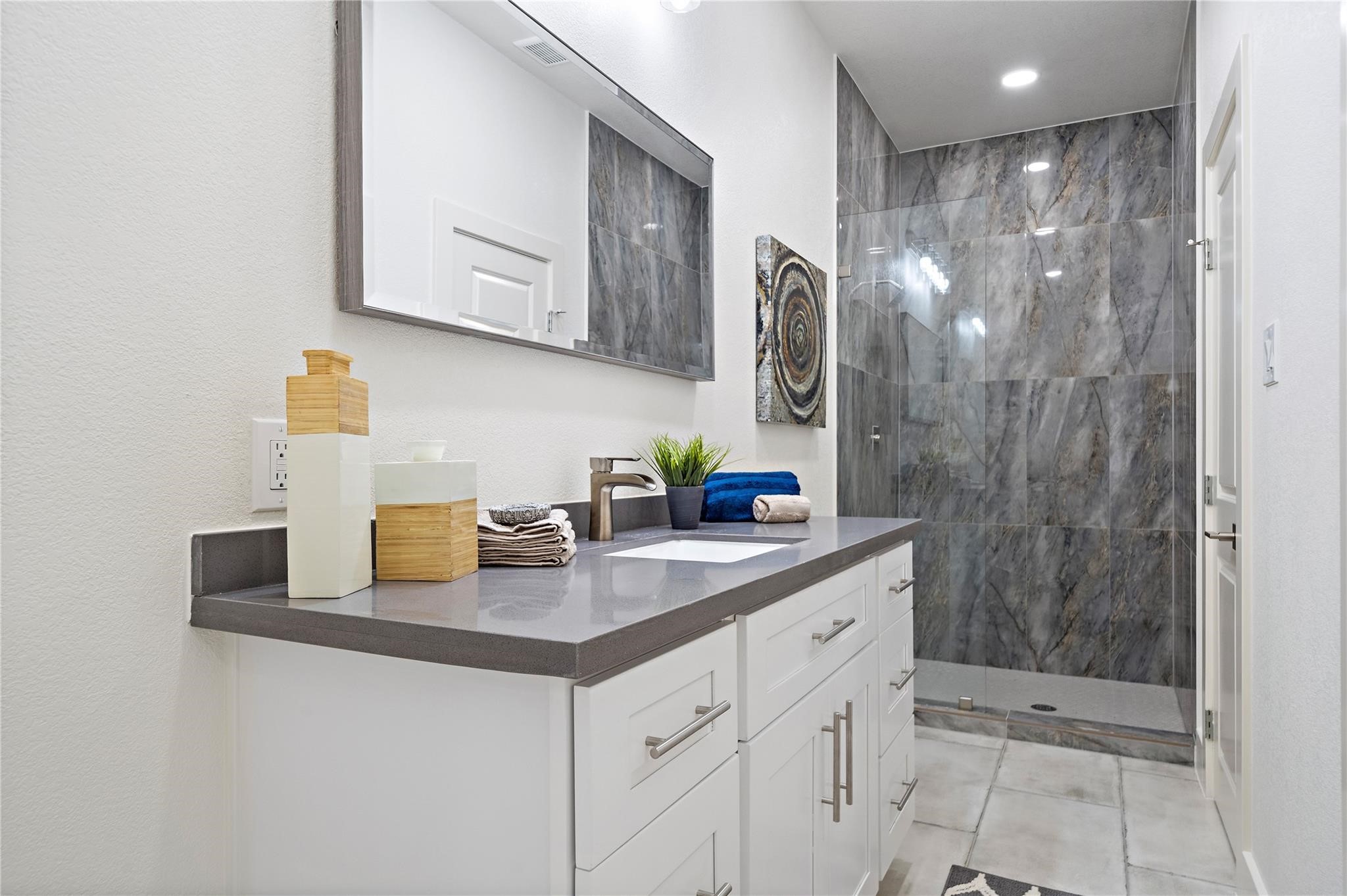 459 Live Oak Road Wharton, TX 77488 - Photo 21 of 27 a bathroom with a shower sink and mirror