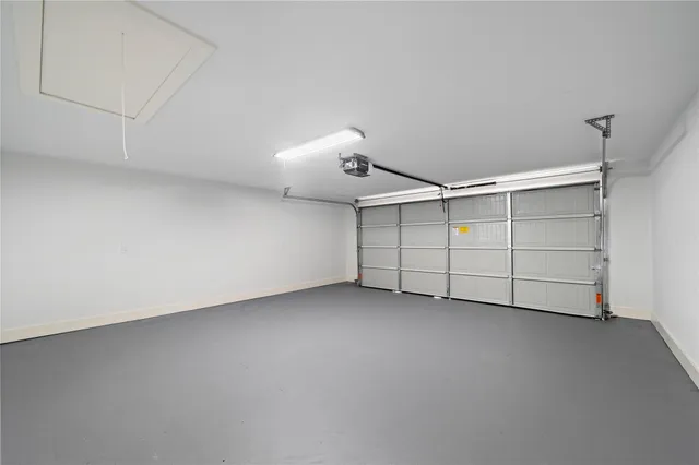 an empty room with closet and cabinet