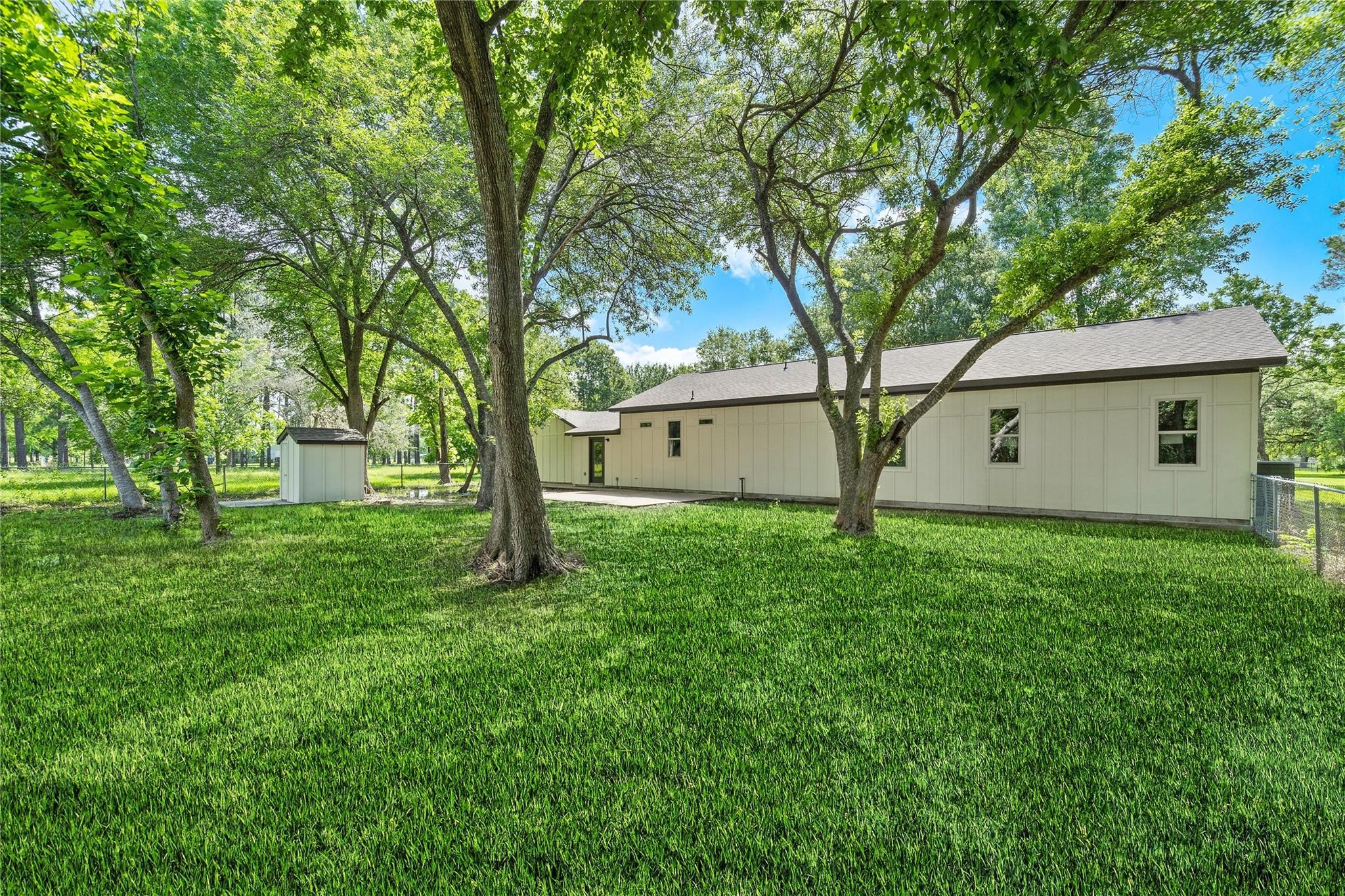 459 Live Oak Road Wharton, TX 77488 - Photo 26 of 27 a view of a house with a backyard