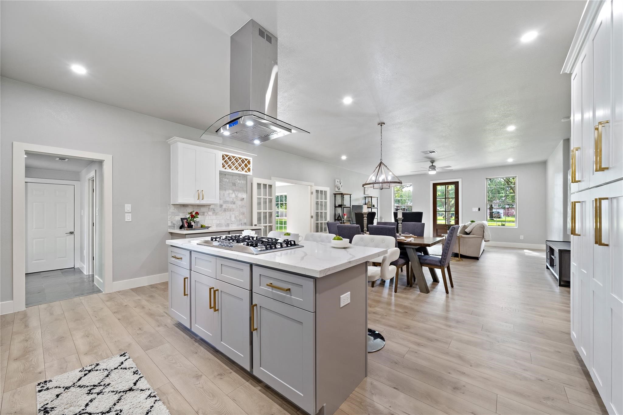 459 Live Oak Road Wharton, TX 77488 - Photo 9 of 27 a kitchen that has a lot of cabinets a sink and a stove in it